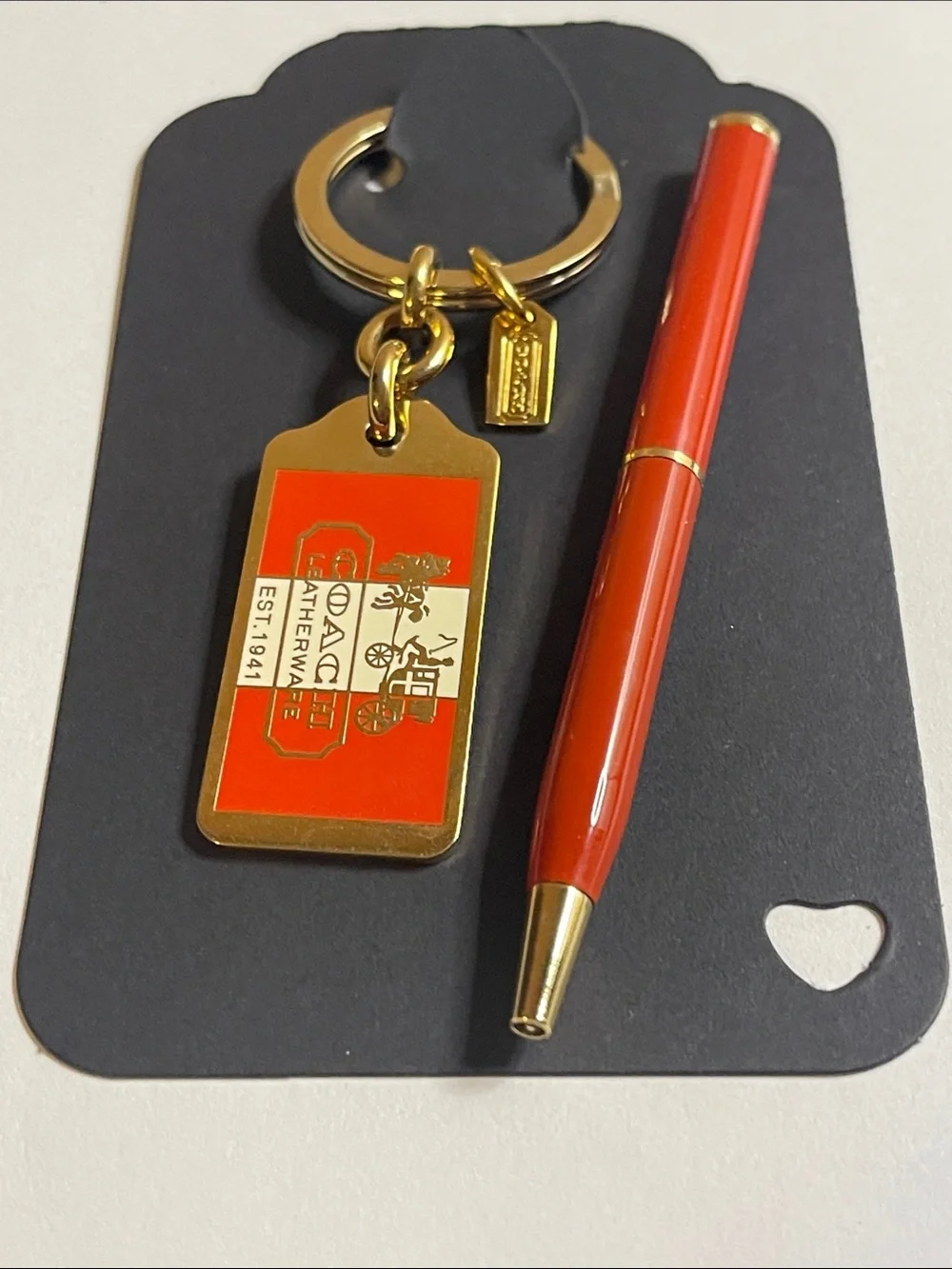 Coach gold tone